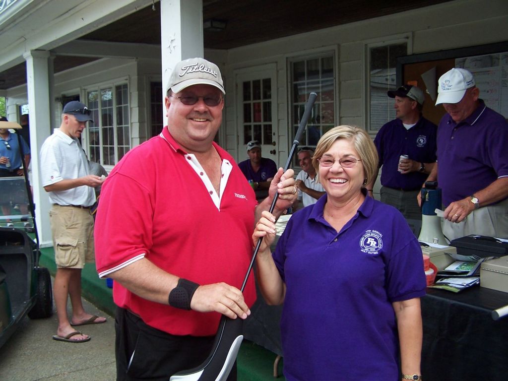 guests smiling at a fundraising event